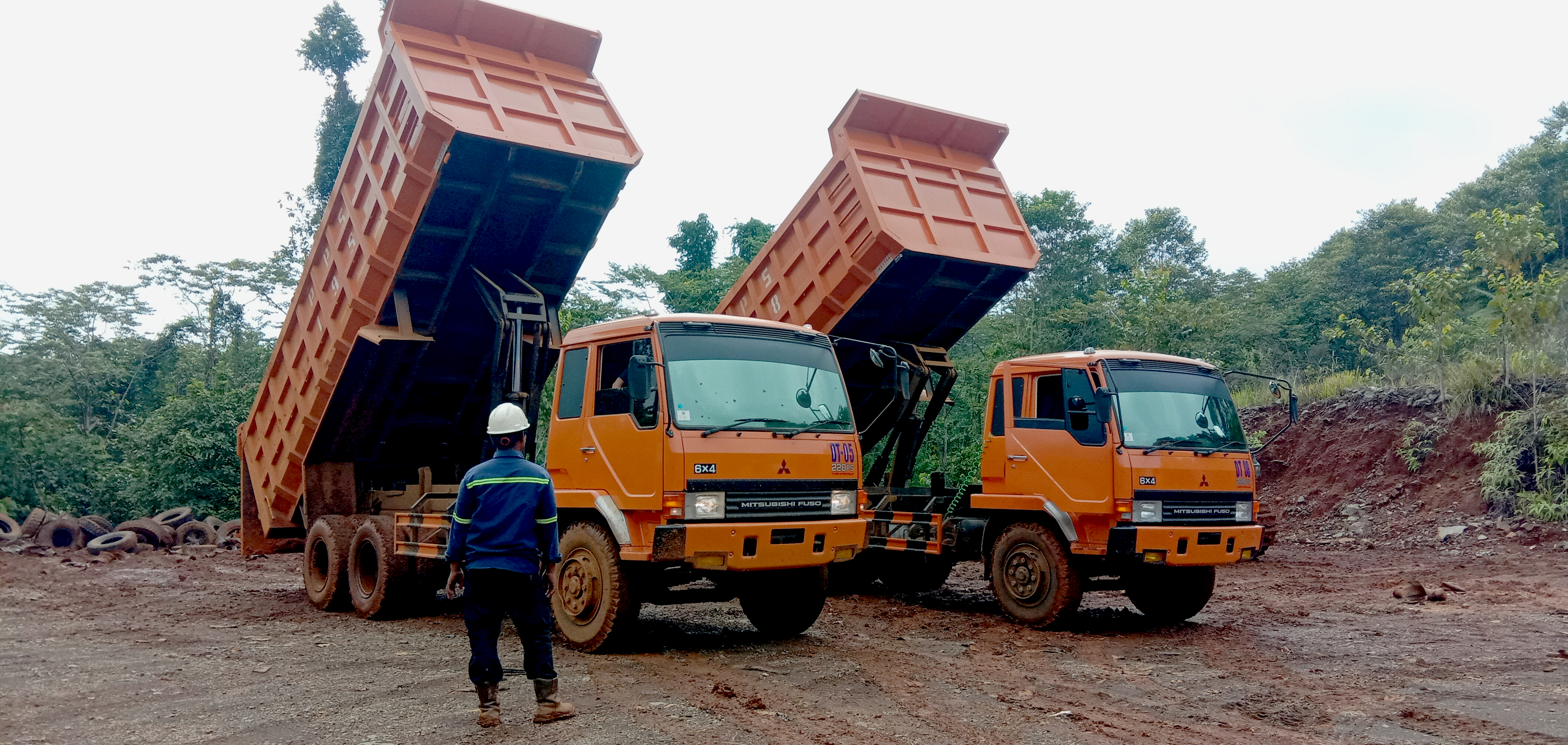 Yellow dump truck in mining area
